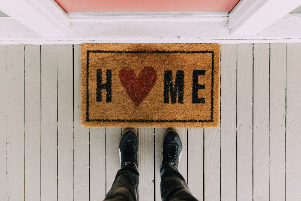 welcome mat to a home, love and heart